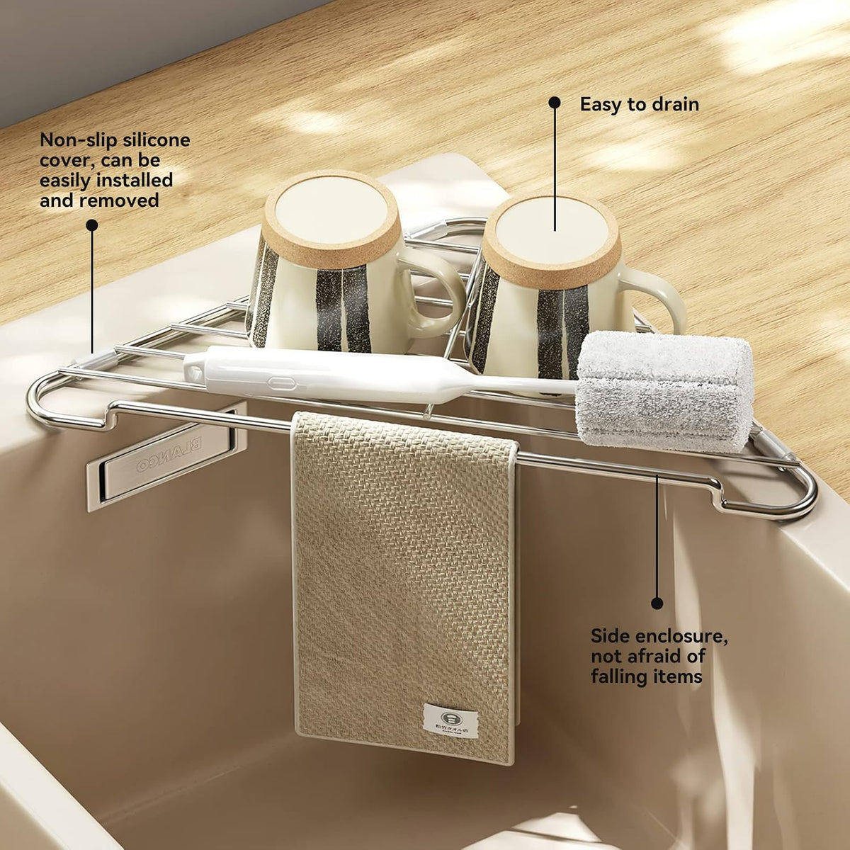 Triangular sink shelf with cups brush and cloth showing silicone covers and side enclosure